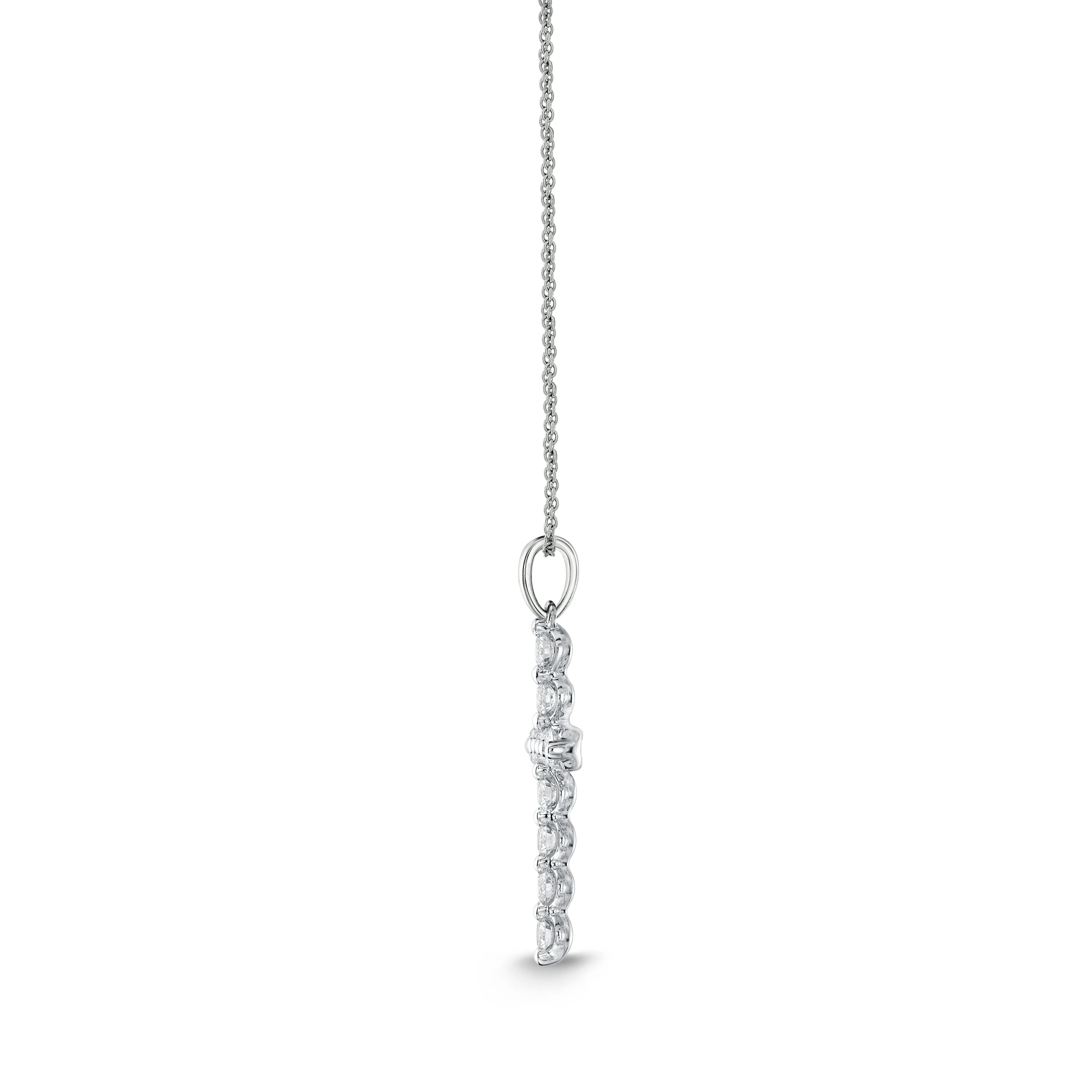 18KW DIAMOND CROSS .58CT