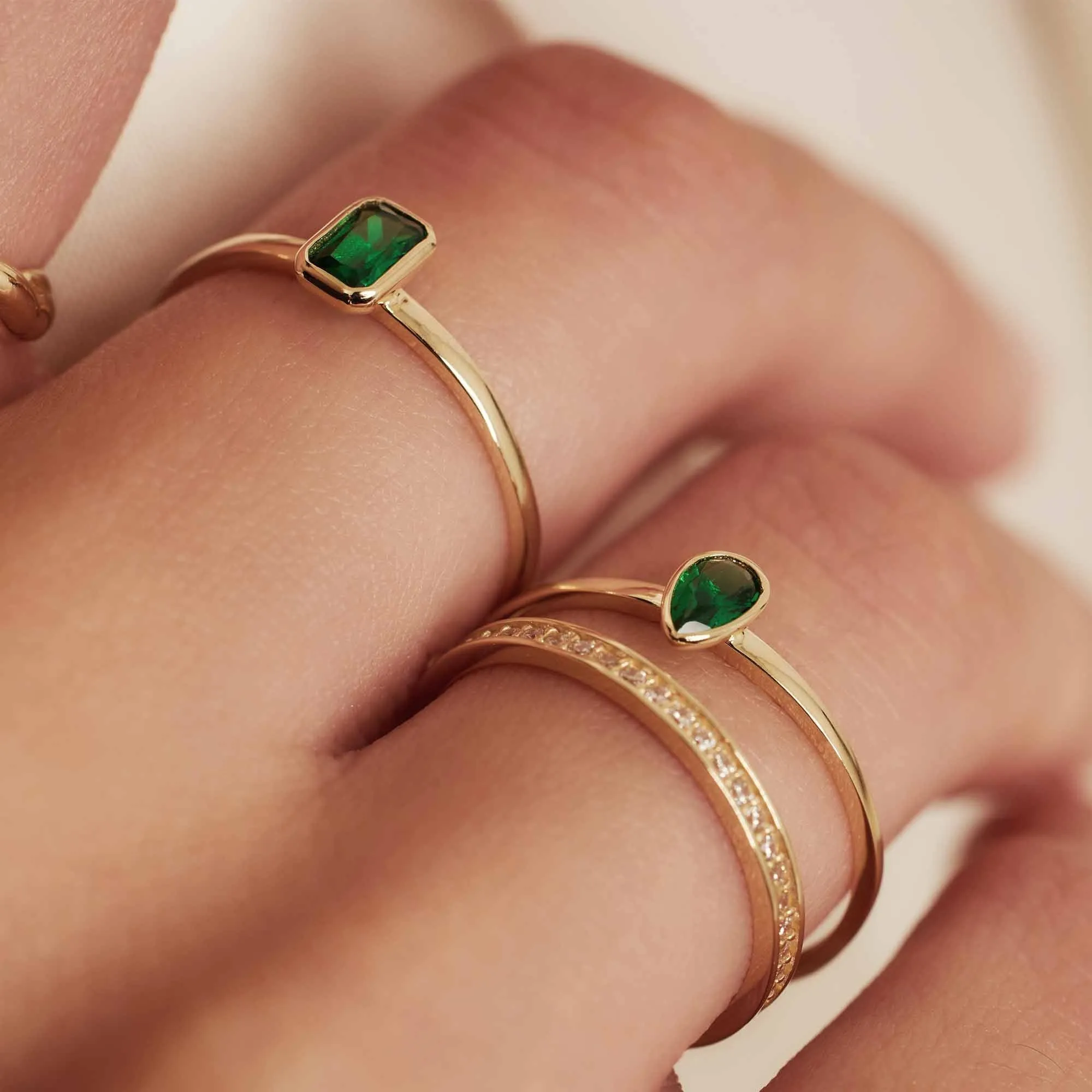 Baguette Olivia 14 karat gold ring with green zirconia stone