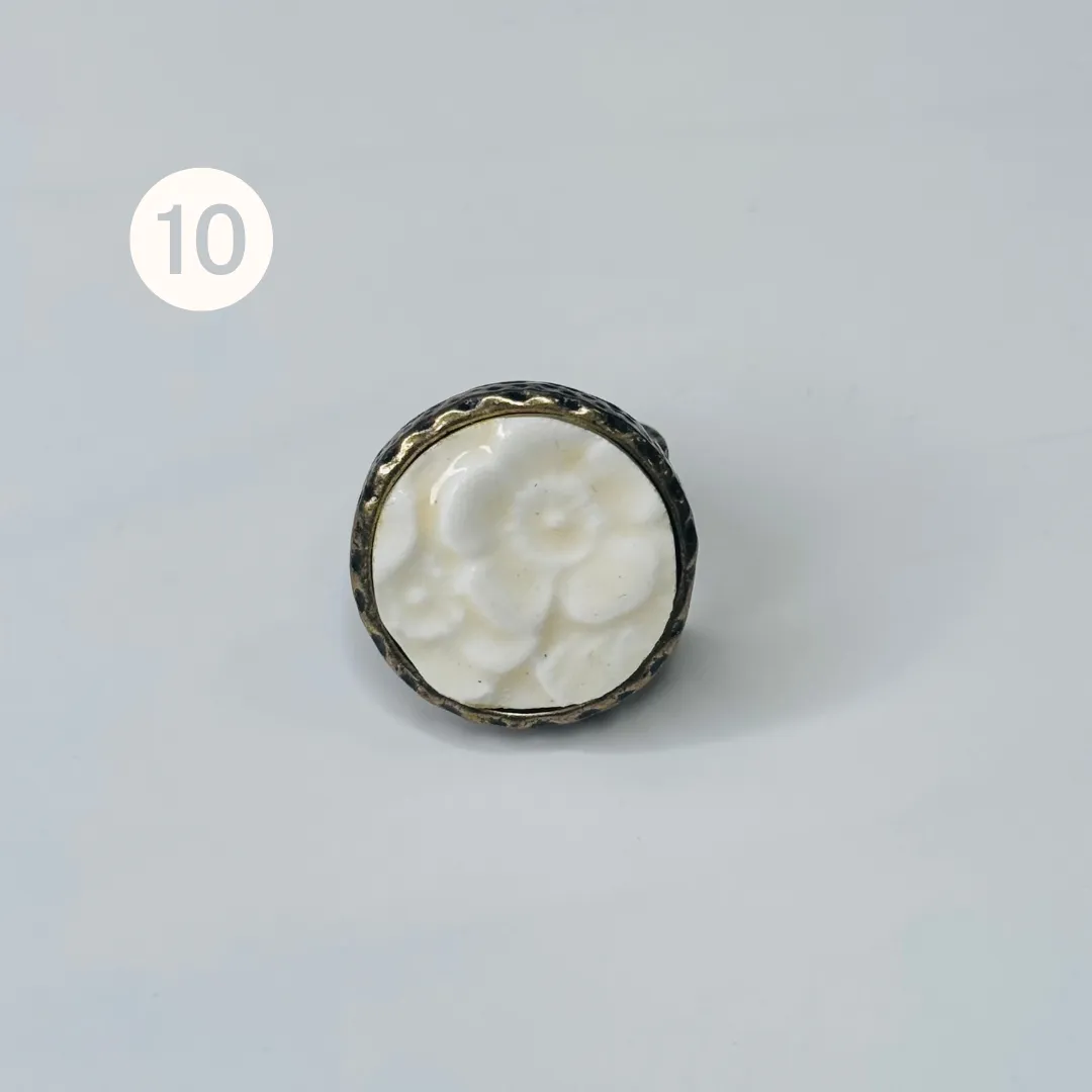 CURIO RINGS