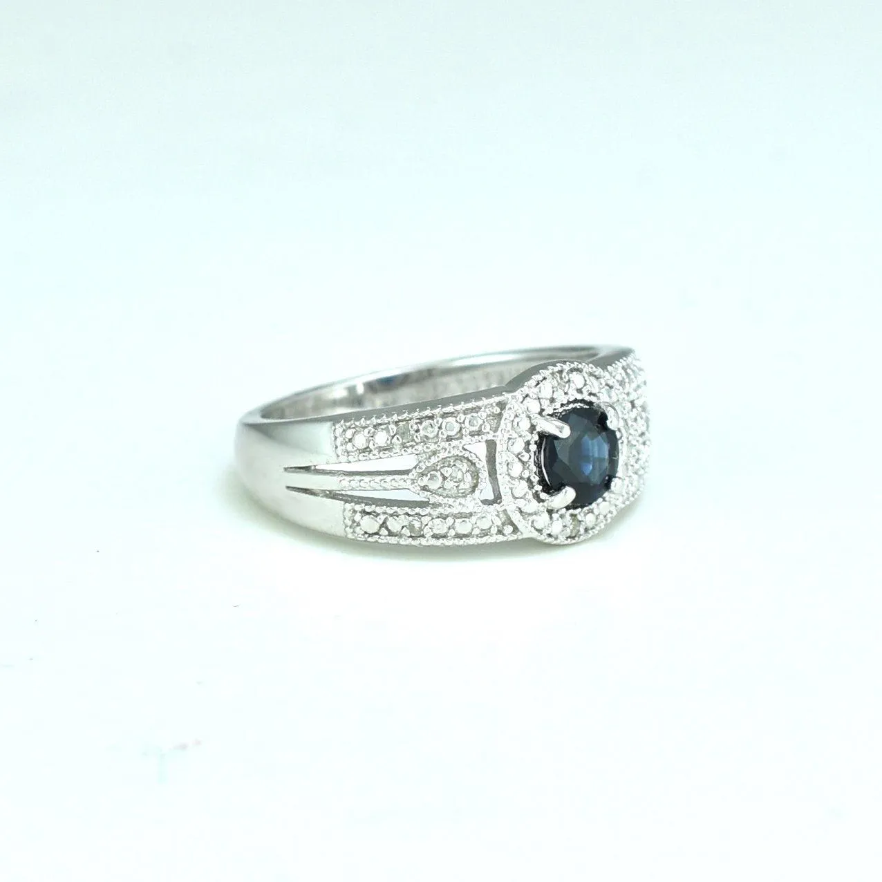 Genuine Sapphire and Diamond Accent Fashion Ring in Silver