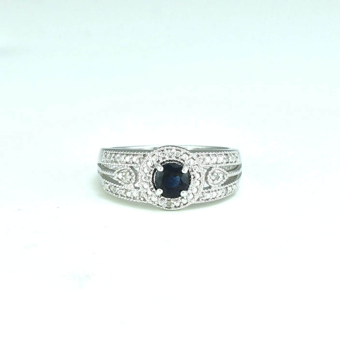 Genuine Sapphire and Diamond Accent Fashion Ring in Silver
