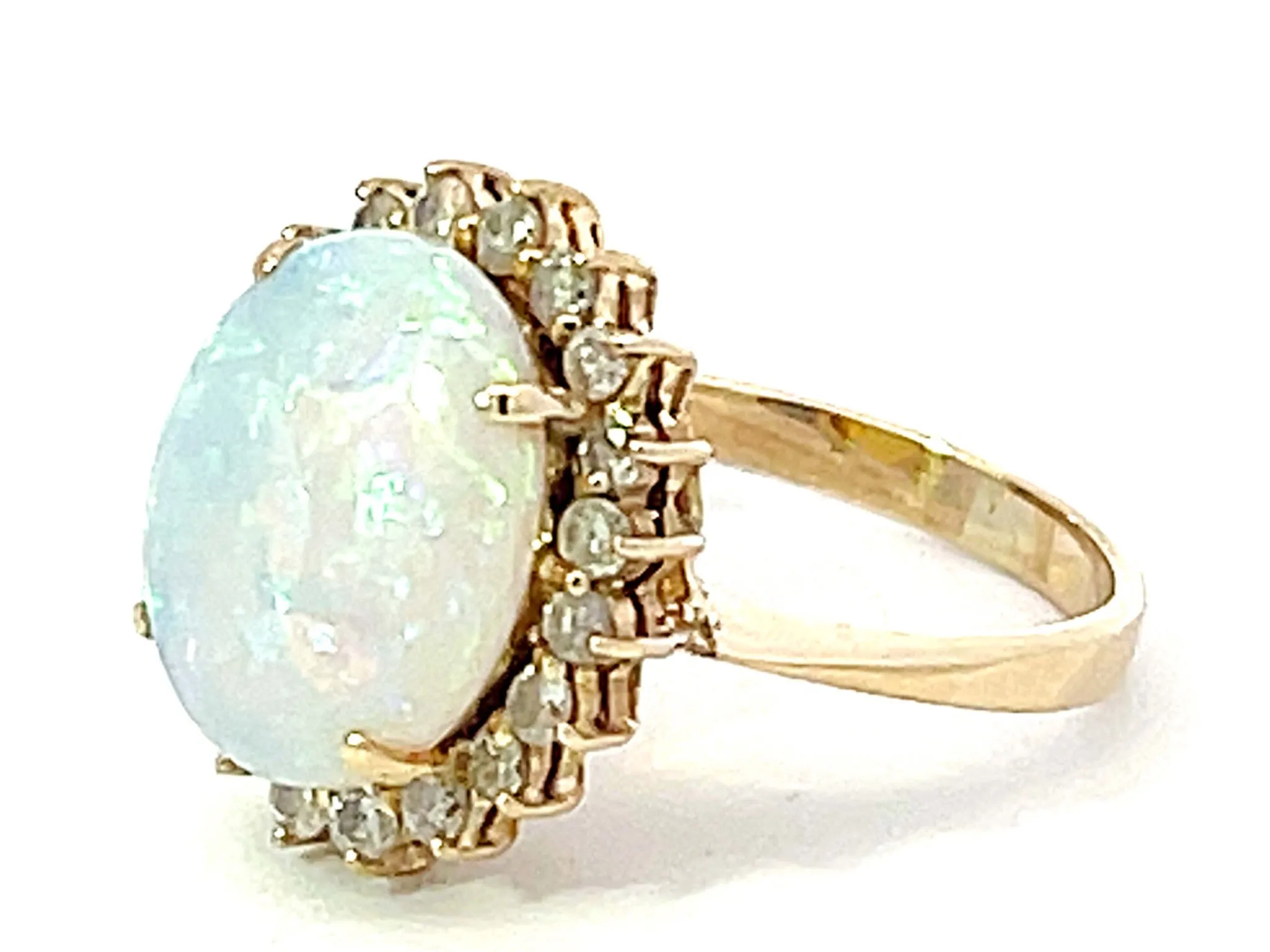 Opal and Diamond Halo Ring in 14k Yellow Gold