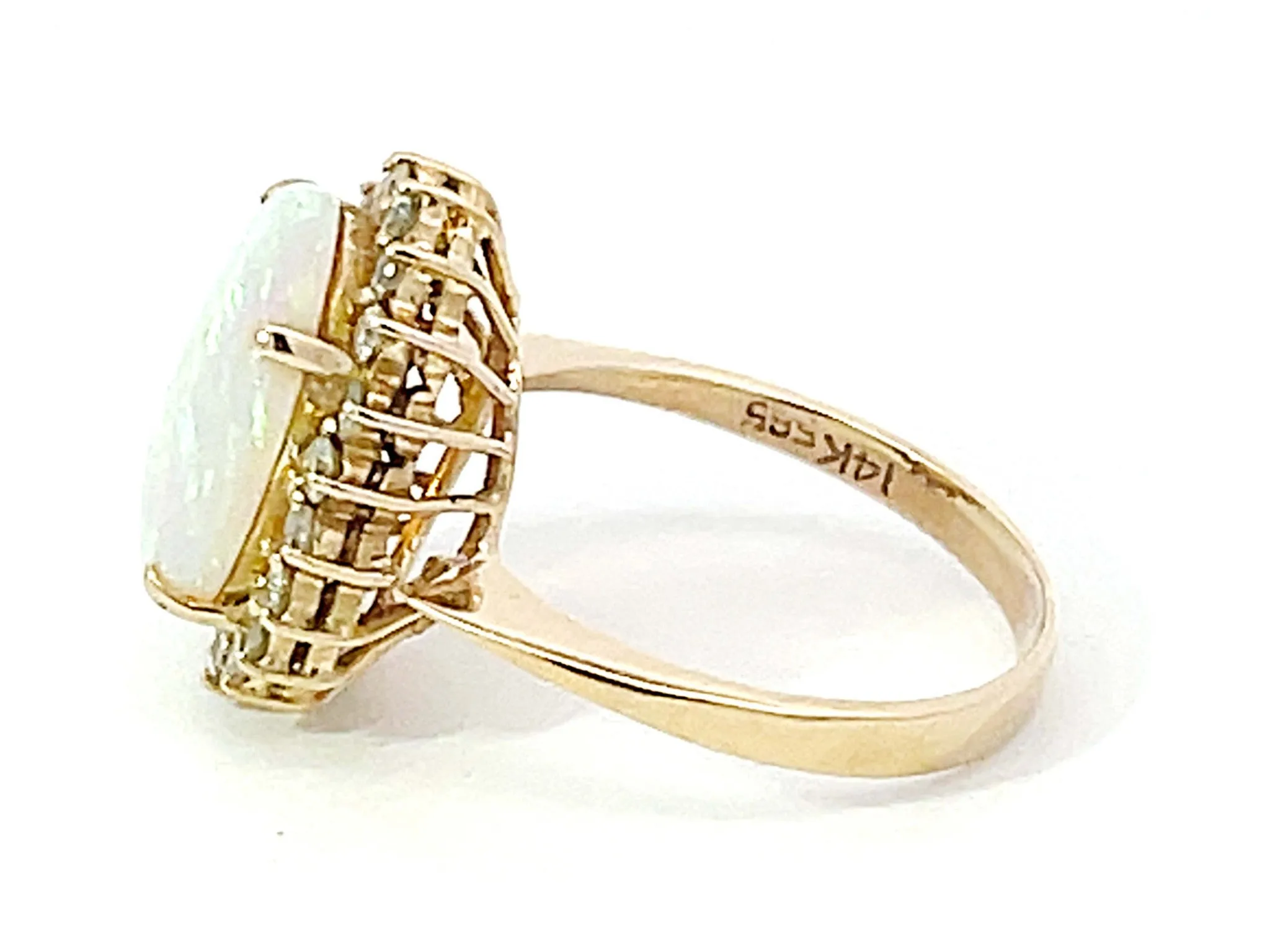 Opal and Diamond Halo Ring in 14k Yellow Gold