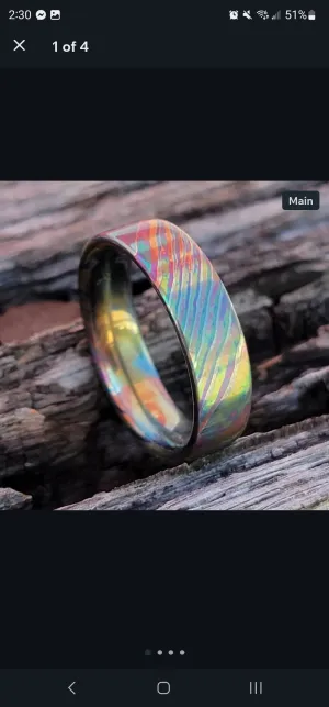 SUPERNOVA Double anodized titanium damascus with titanium liner