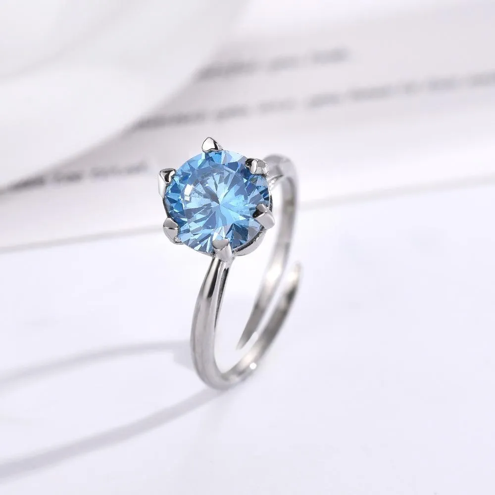 Titanium Steel Rotating Six-heart Claw Support Decompression Rotating Ring Women's Sapphire Ring Cross Living Simple Fashion