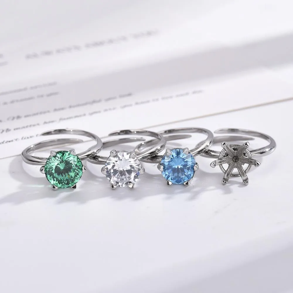 Titanium Steel Rotating Six-heart Claw Support Decompression Rotating Ring Women's Sapphire Ring Cross Living Simple Fashion