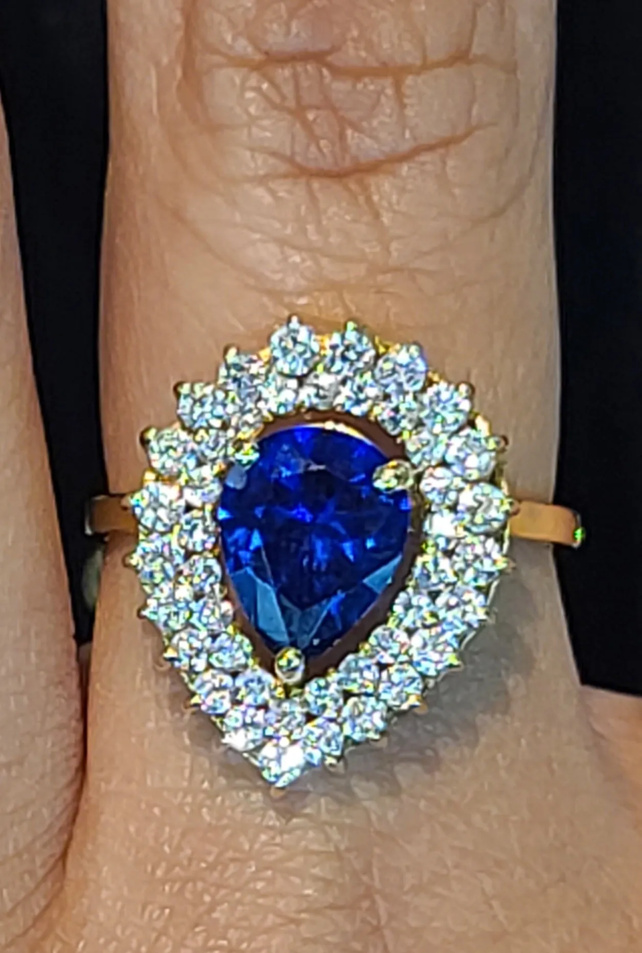 Yellow Gold Tear Drop Ring with Blue Stone and CZs