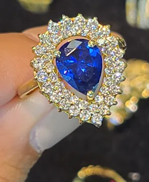Yellow Gold Tear Drop Ring with Blue Stone and CZs